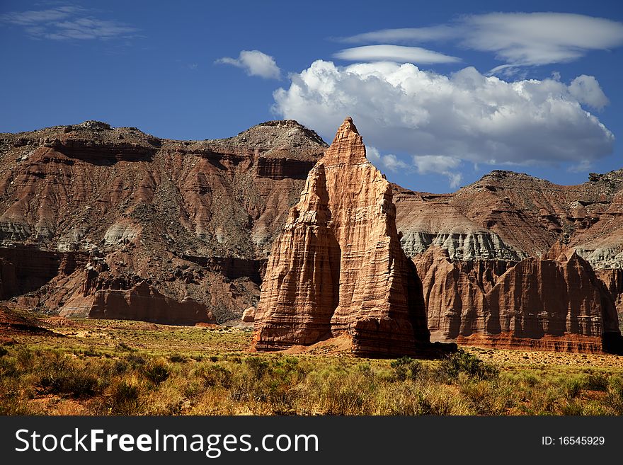 View of the red rock formations in Capitol Reef National Park with blue skyï¿½s and clouds