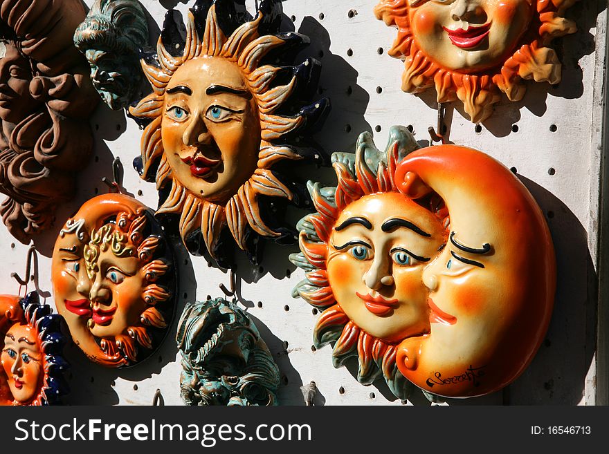 Typical South Italy ceramics representing the sun and the moon. Typical South Italy ceramics representing the sun and the moon