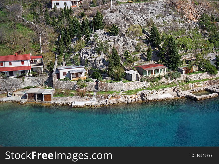 Small fisherman village and crystal clear sea near Karlobag in Croatia.