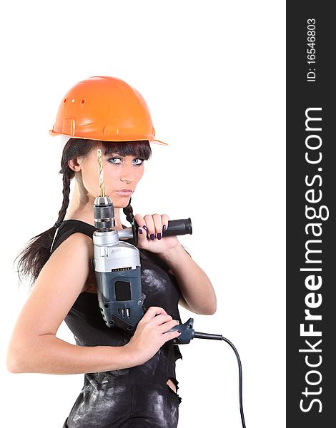 Girl in an orrange hard hat hold a drill. Girl in an orrange hard hat hold a drill