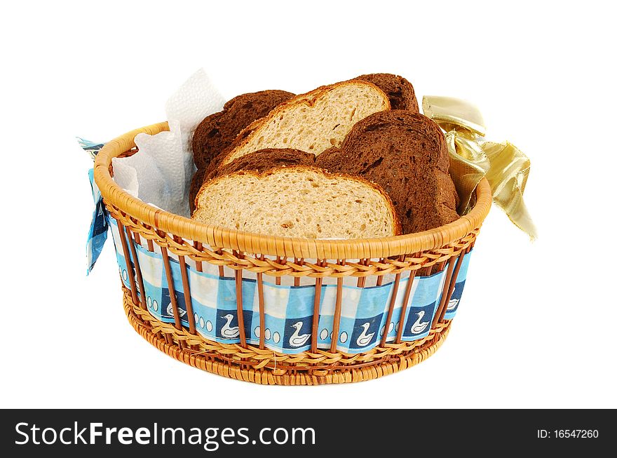 Three type of bread set in the basket isolated on the white background. Three type of bread set in the basket isolated on the white background.