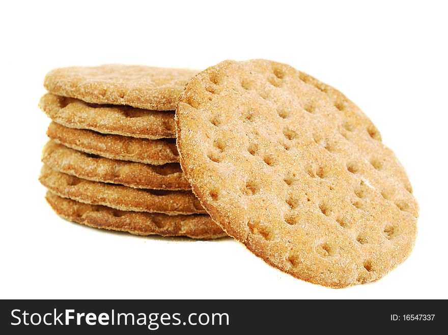 Slices of crispbread isolated on white background. It's good alternative for traditional bread. Slices of crispbread isolated on white background. It's good alternative for traditional bread.