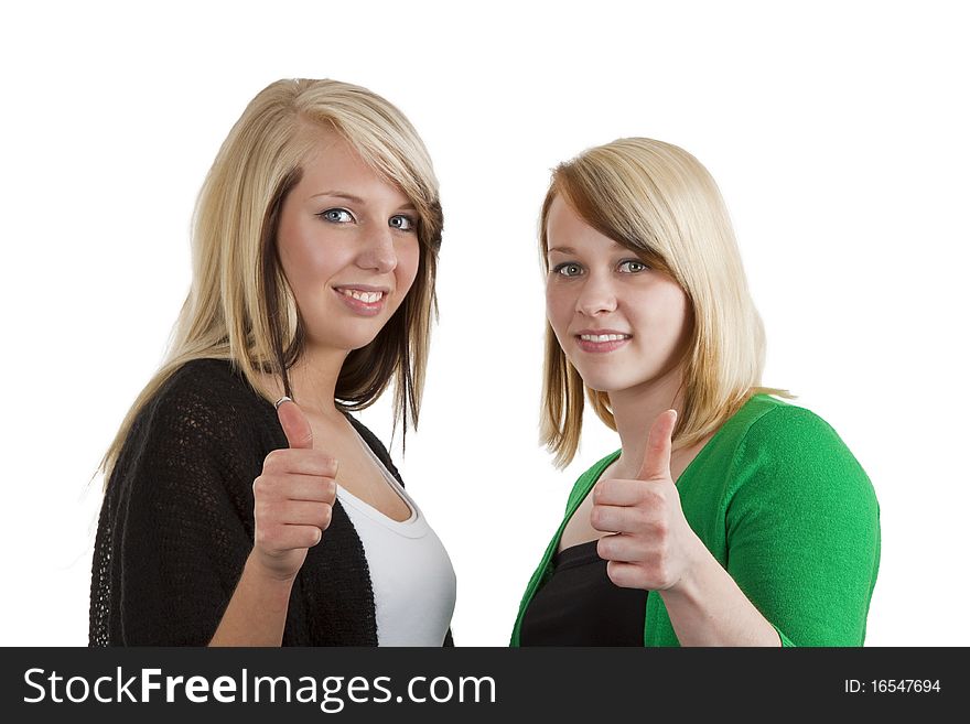 Two young caucasian girlfriends having fun together  isolated over white background. Two young caucasian girlfriends having fun together  isolated over white background