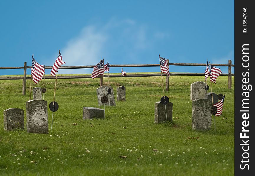 Old cemetary with american flags in oswego,ny. Old cemetary with american flags in oswego,ny