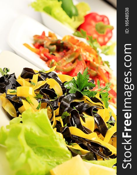 Food theme: tasty colorful pasta dishes with vegetables. Food theme: tasty colorful pasta dishes with vegetables.