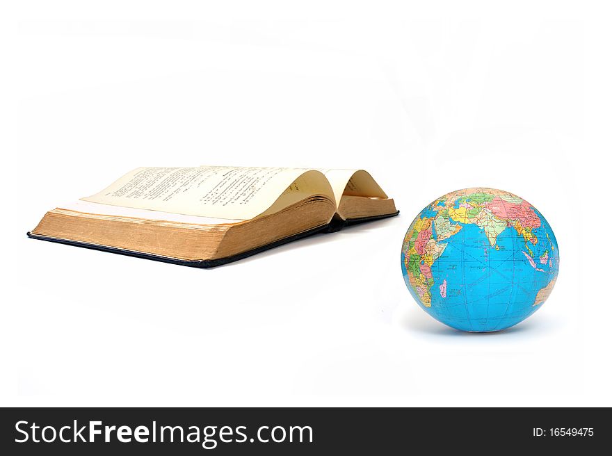 Globe atlas and an open book. Globe atlas and an open book