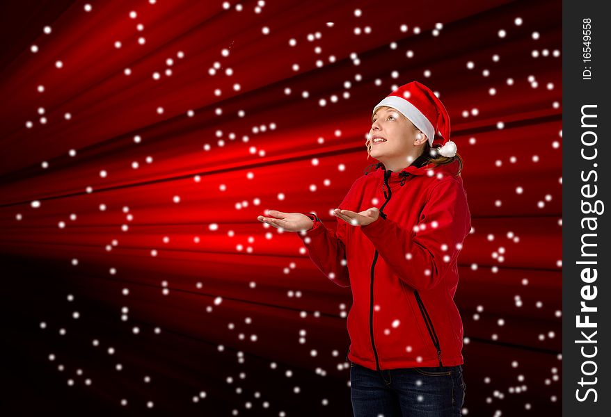 Cute young girl with santa hat, on red-black background