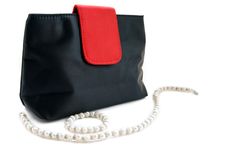 Female Bag And Beads Royalty Free Stock Photography Female Bag And Beads Royalty Free Stock Photography