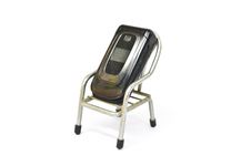 Old Mobile Phone On Small Chair Stock Photos Old Mobile Phone On Small Chair Stock Photos