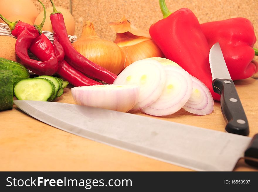 Vegetables and spices on the kitchen table. Vegetables and spices on the kitchen table