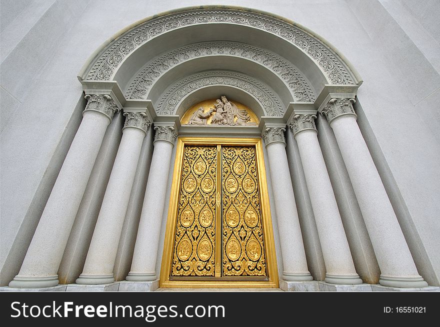 The Door Of Church With Jesus Sculpture