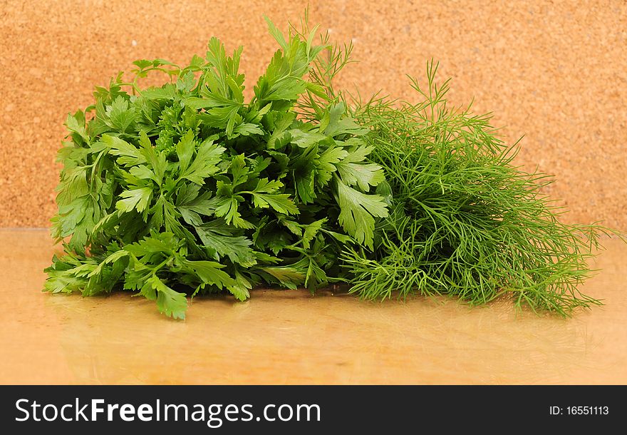 Fresh parsley and celery to the kitchen board