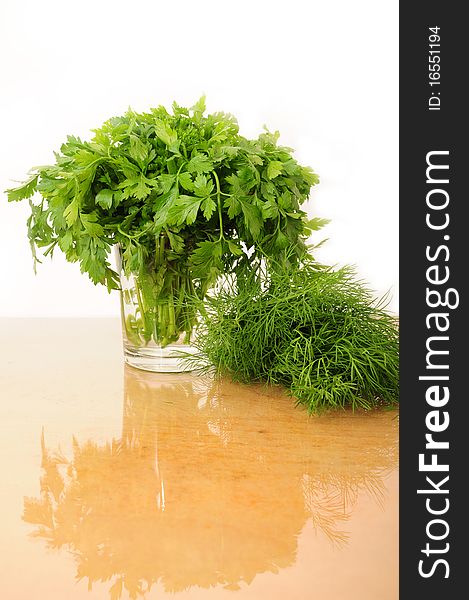 Fresh parsley and celery to the kitchen board