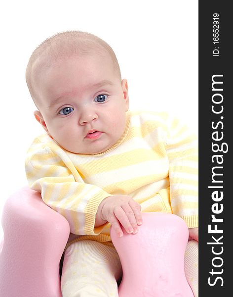 Photograph of cute baby with toy isolated against white. Photograph of cute baby with toy isolated against white