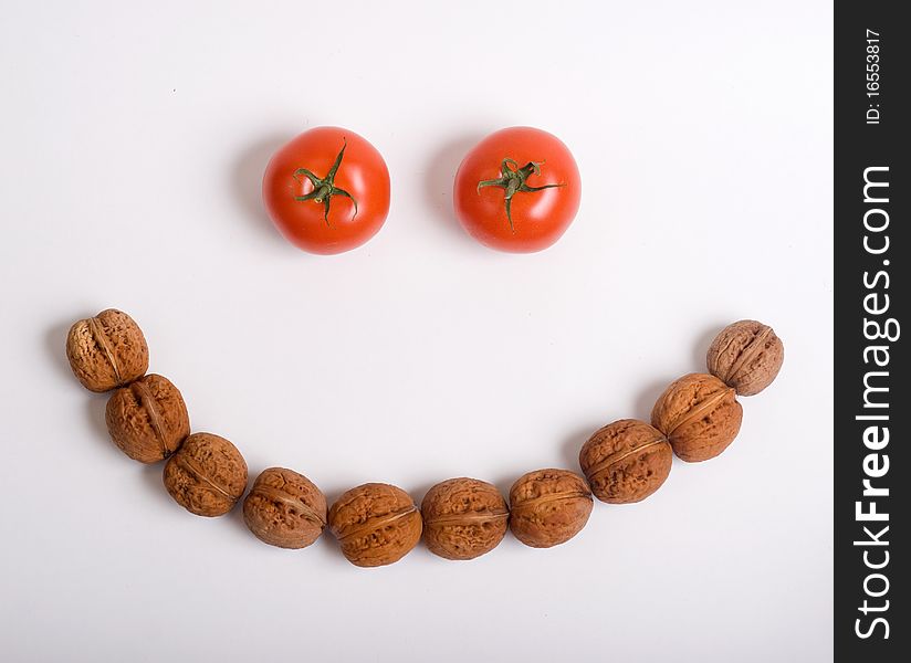 Tomatoes and walnuts smiley face