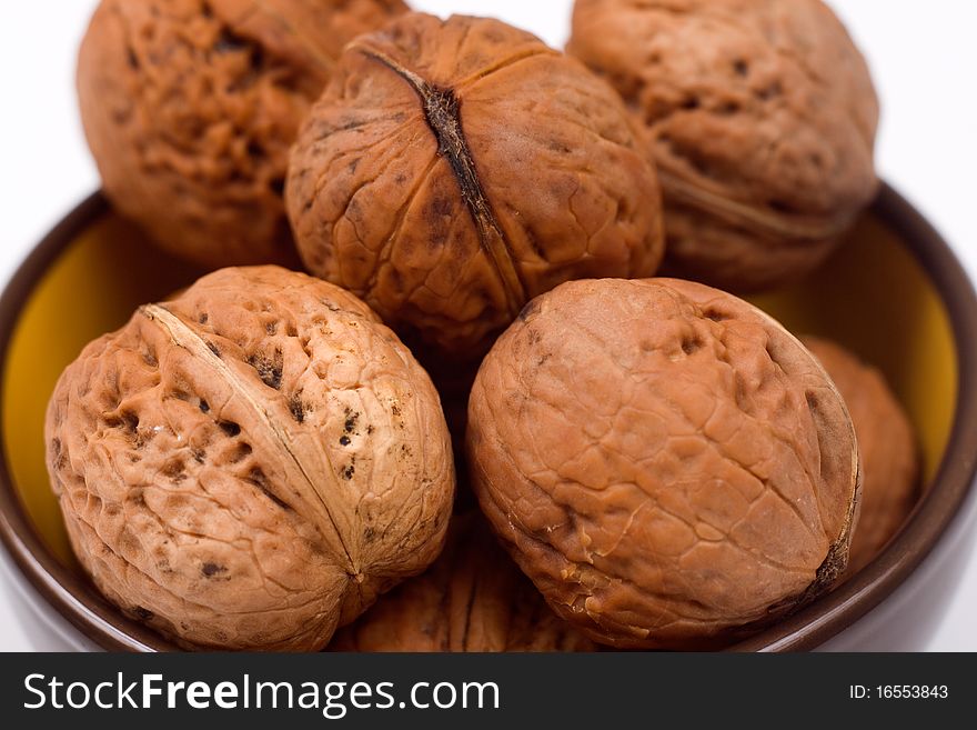 Five walnuts in a bowl