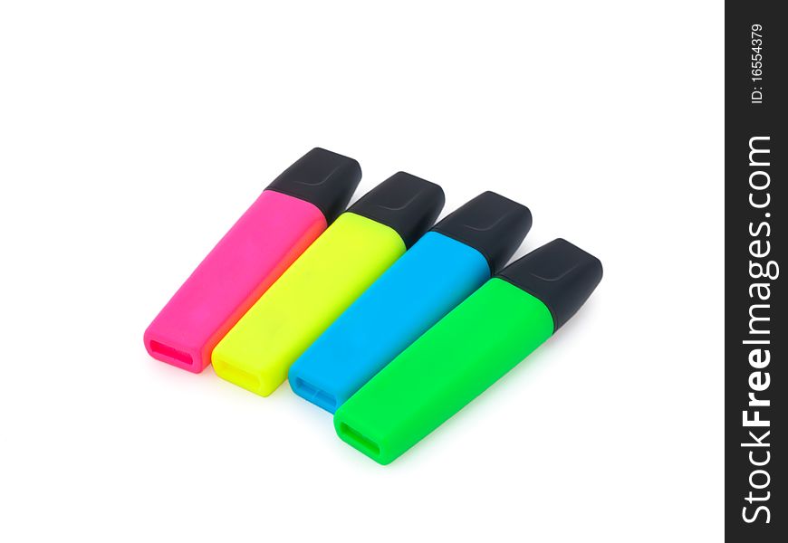 Four colorful highlighters isolated on a white background