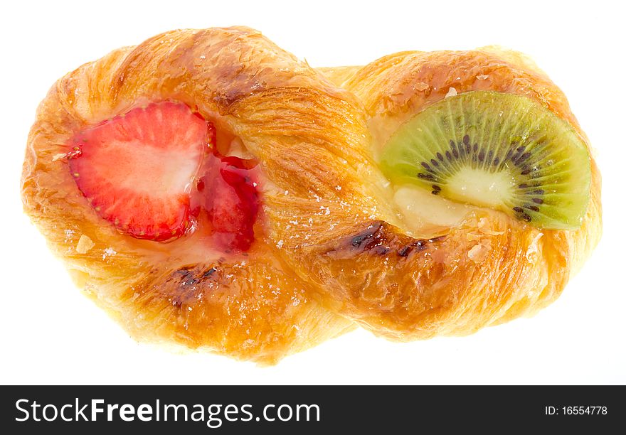 Close-up puff pastry with kiwi and strawberry, isolated on white