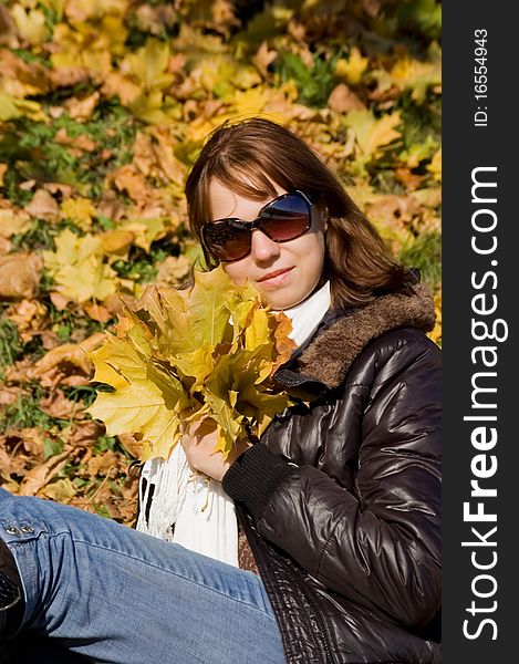 Cute Girl With Autumn Leaves