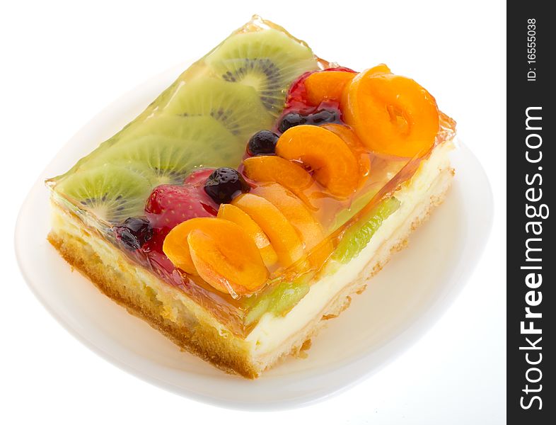 Close-up curd cake with fruits and berries, isolated on white