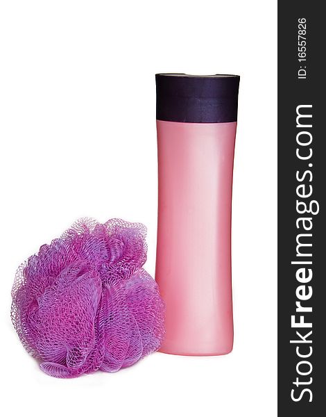 Pink cosmetic bottle and bast whisp isolated on the white. Pink cosmetic bottle and bast whisp isolated on the white