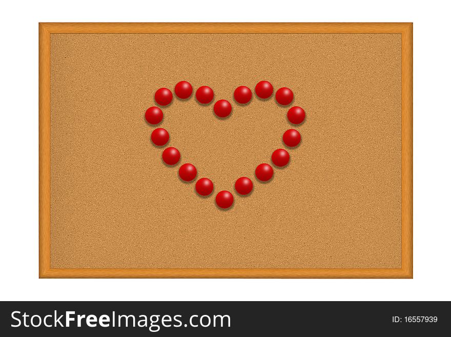 Red pushpins in a shape of a heart