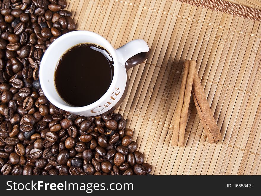 Coffee cup and coffee beans top view