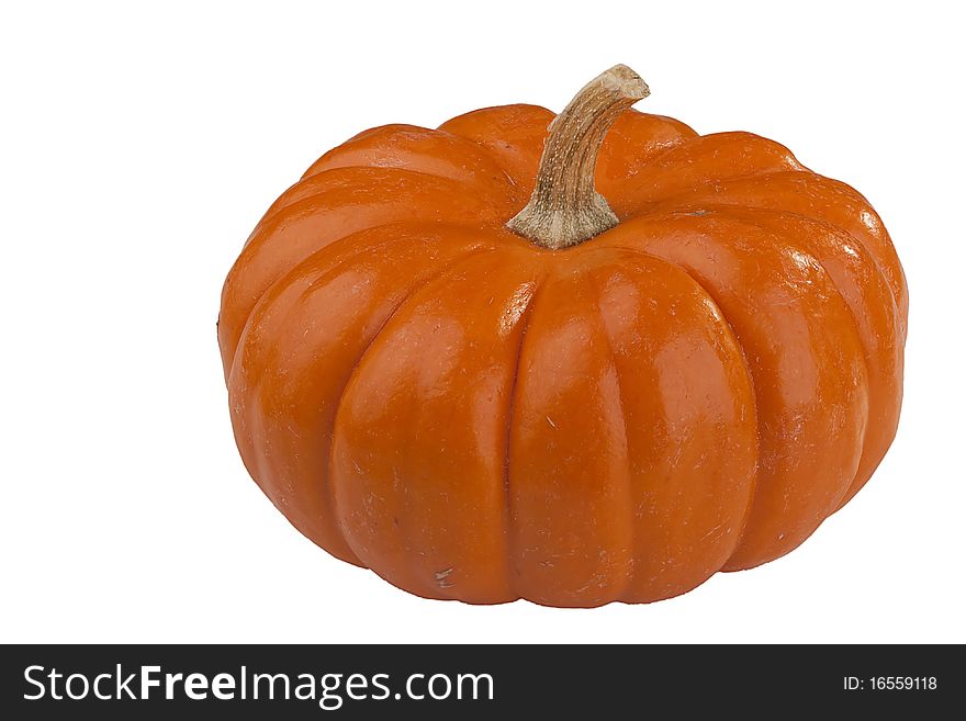 Small orange pumpkins symbolising autumn holidays and used in decorative works.