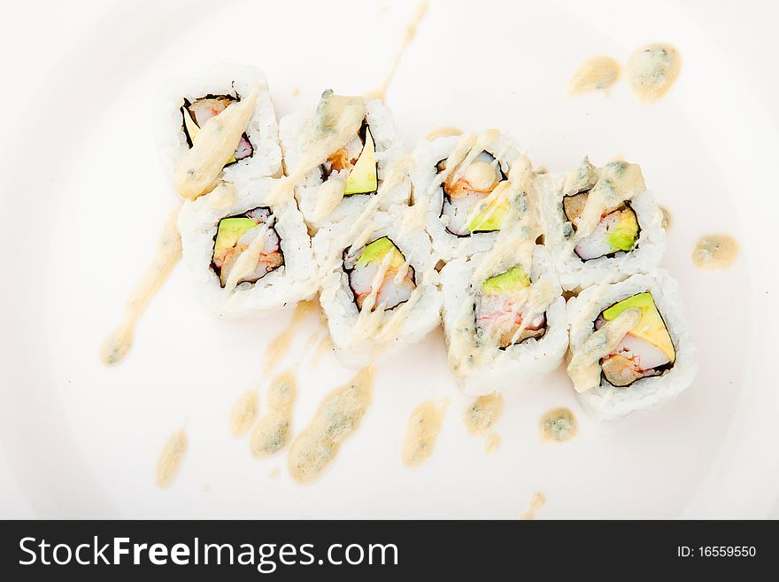 Maki rolls and sashimi isolated on white background. Maki rolls and sashimi isolated on white background