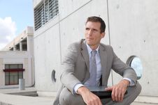 Businessman Sitting Outside The Office Stock Photo Businessman Sitting Outside The Office Stock Photo