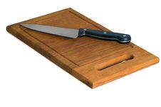 Knife On A Chopping Board Stock Images