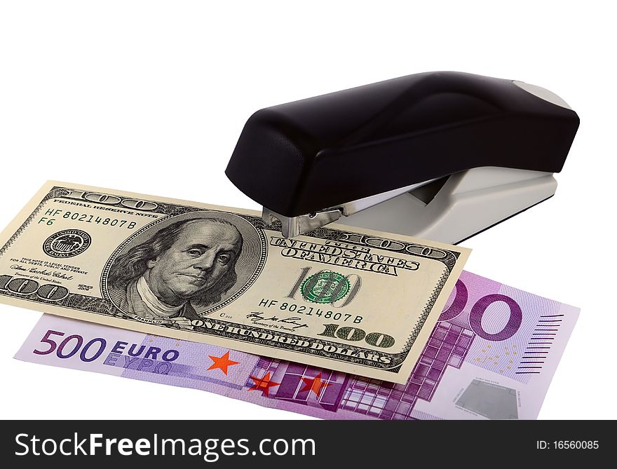 Banknotes of various currencies in an environment of staplers of the different sizes and colors. Symbolizes interrelation of various world currencies. The file includes a clipping path so it is easy to work with. Banknotes of various currencies in an environment of staplers of the different sizes and colors. Symbolizes interrelation of various world currencies. The file includes a clipping path so it is easy to work with.