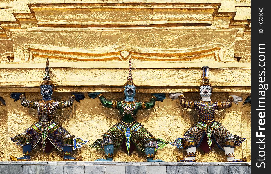 The garuda statues on the base of golden satupa in The Emerald Buddha Temple in Bangkok, Thailand. The garuda statues on the base of golden satupa in The Emerald Buddha Temple in Bangkok, Thailand.