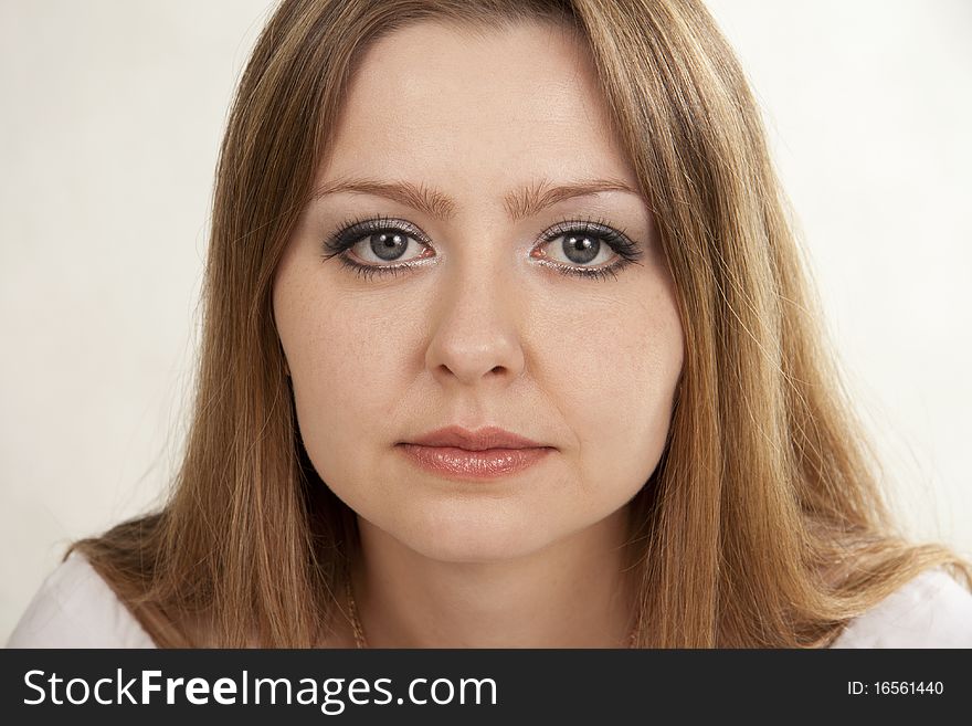 Beautiful woman sad. White background