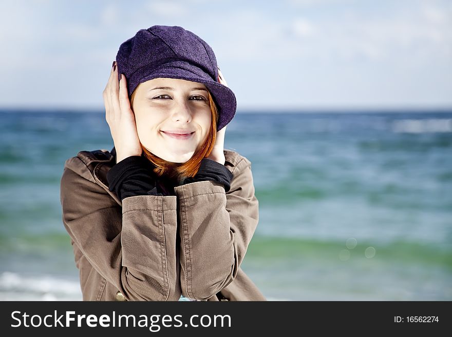 Fashion young women at the beach in sunny day. Outdoor photo.