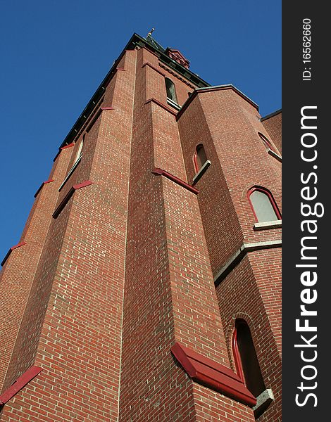 Tall brick church steeple