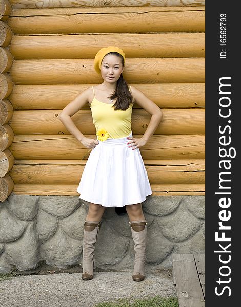 A portrait of a girl with yellow flower