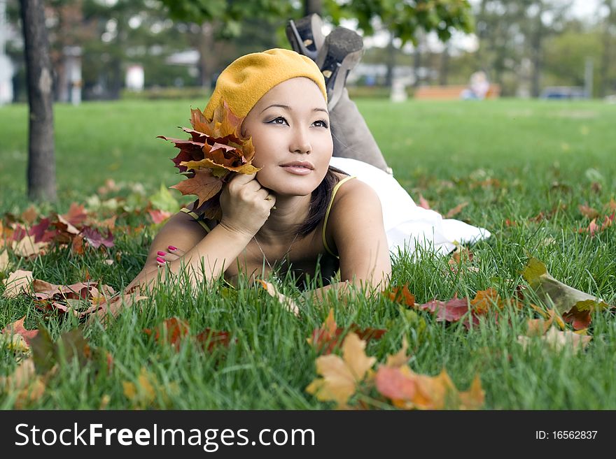 Girl resting in autumn park. Girl resting in autumn park