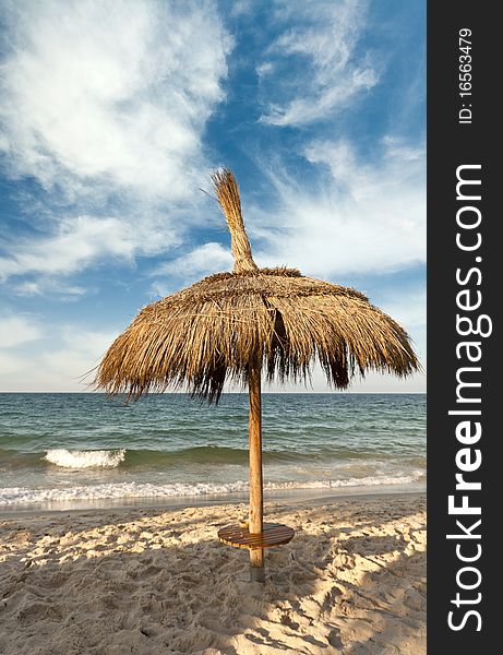 Hut on Caribbean Beach on sunny day