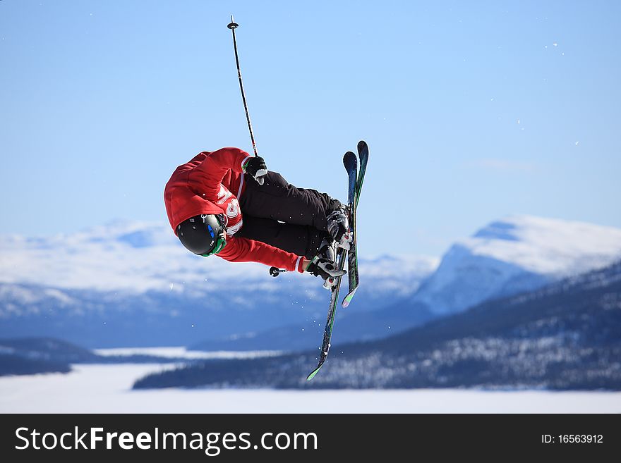 Teenage skier who jump high up in the air. Teenage skier who jump high up in the air