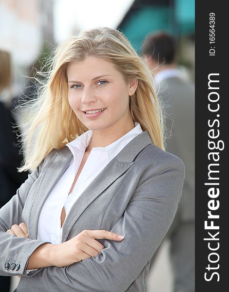 Blond businesswoman with arms crossed. Blond businesswoman with arms crossed