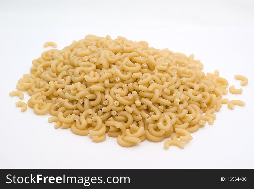Noodless made fom wheat flour on a white background