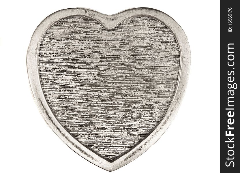 Close up of a Silver heart on white. Close up of a Silver heart on white