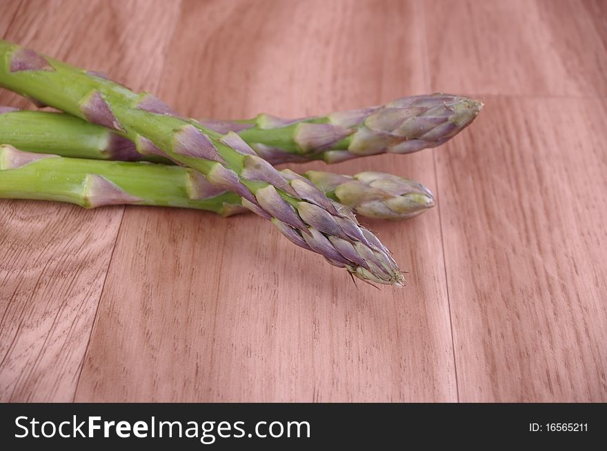 Fresh green Asparagus spears on table top