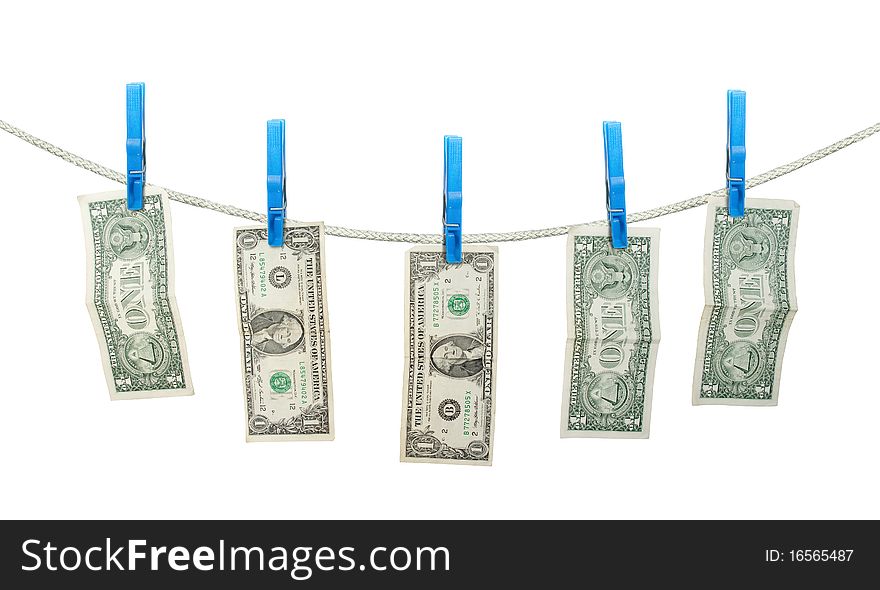 US Dollar's Hanging on Rope with Clothespins isolated background. US Dollar's Hanging on Rope with Clothespins isolated background