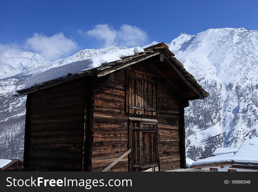 Chalet in the Saas-Fee village in the Swiss Alps.Its location close to the glaciers of the Dom and the Allalinhorn provides winter sport opportunities throughout the year, and neighbouring peaks such as the Weissmies, the Nadelhorn and the Lenzspitze are popular climbs in the summer season. The community is considered to be a very attractive winter sport destination in the Swiss Alps. Typical activities include skiing, carving, snowshoe trekking, canyon climbing and ice climbing. Chalet in the Saas-Fee village in the Swiss Alps.Its location close to the glaciers of the Dom and the Allalinhorn provides winter sport opportunities throughout the year, and neighbouring peaks such as the Weissmies, the Nadelhorn and the Lenzspitze are popular climbs in the summer season. The community is considered to be a very attractive winter sport destination in the Swiss Alps. Typical activities include skiing, carving, snowshoe trekking, canyon climbing and ice climbing.