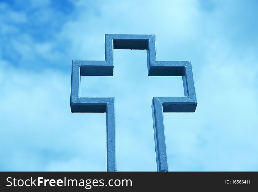 A catholic church cross in the sky background. A catholic church cross in the sky background