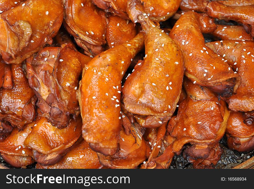 Fried drumsticks pile with sesame topping.