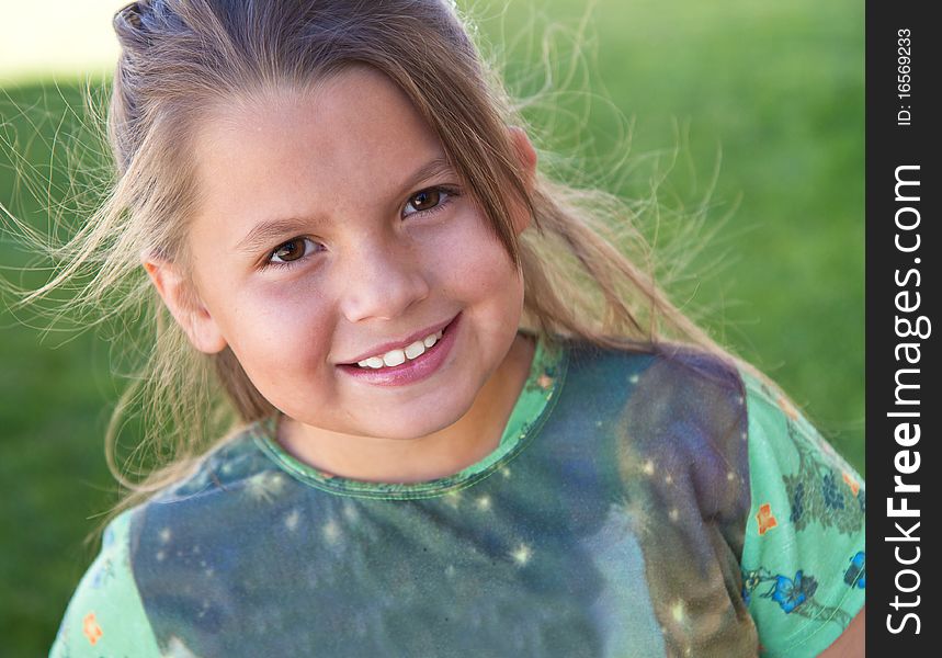 Cute little girl enjoying the outdoors. Cute little girl enjoying the outdoors