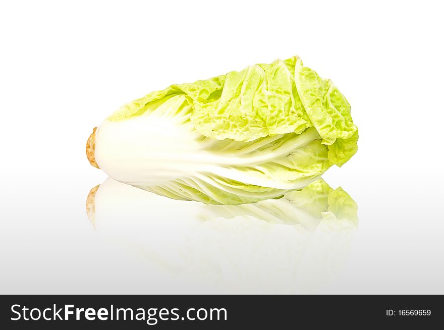 Green Fresh Lettuce on white background with reflection